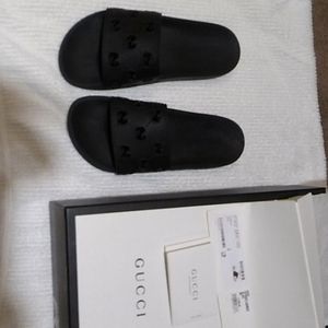 Gucci rubber GG slides